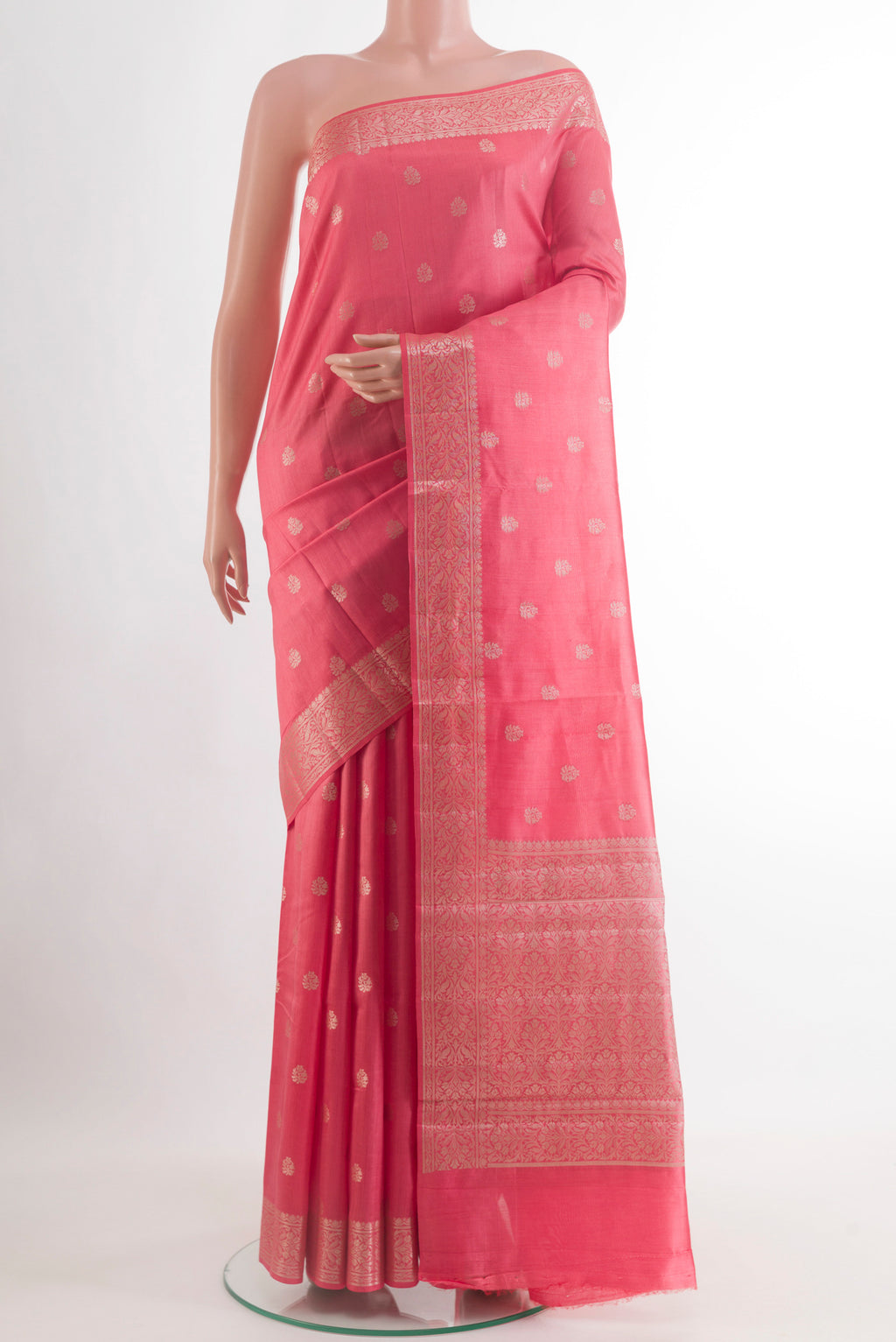 Pink Banarasi Raw Silk Saree with Zari Butta on the body and Zari Border.  displayed on a mannequin