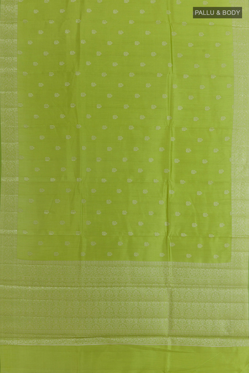 Flat view of Green Banarasi Raw Silk Saree with Zari Butta on the body and Zari Border. 