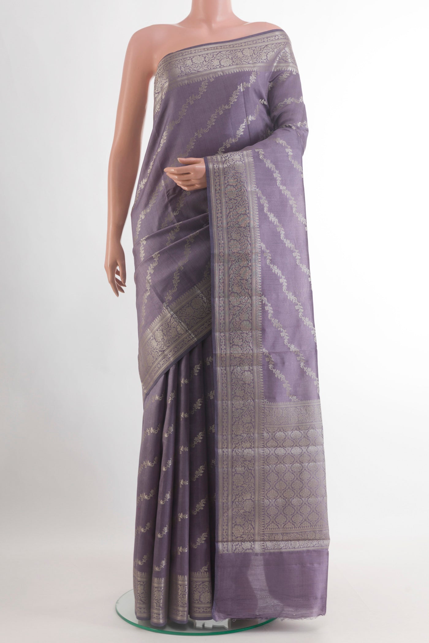 Lilac Banarasi Raw Silk Saree with Zari Brocade on the body and Zari Border.  displayed on a mannequin
