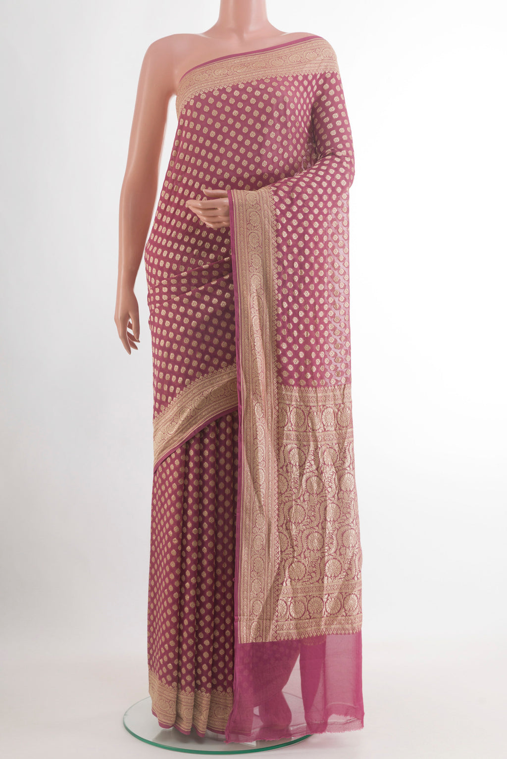 Lavender Banarasi Georgette Saree with Zari Butta on the body and Zari Border.  displayed on a mannequin
