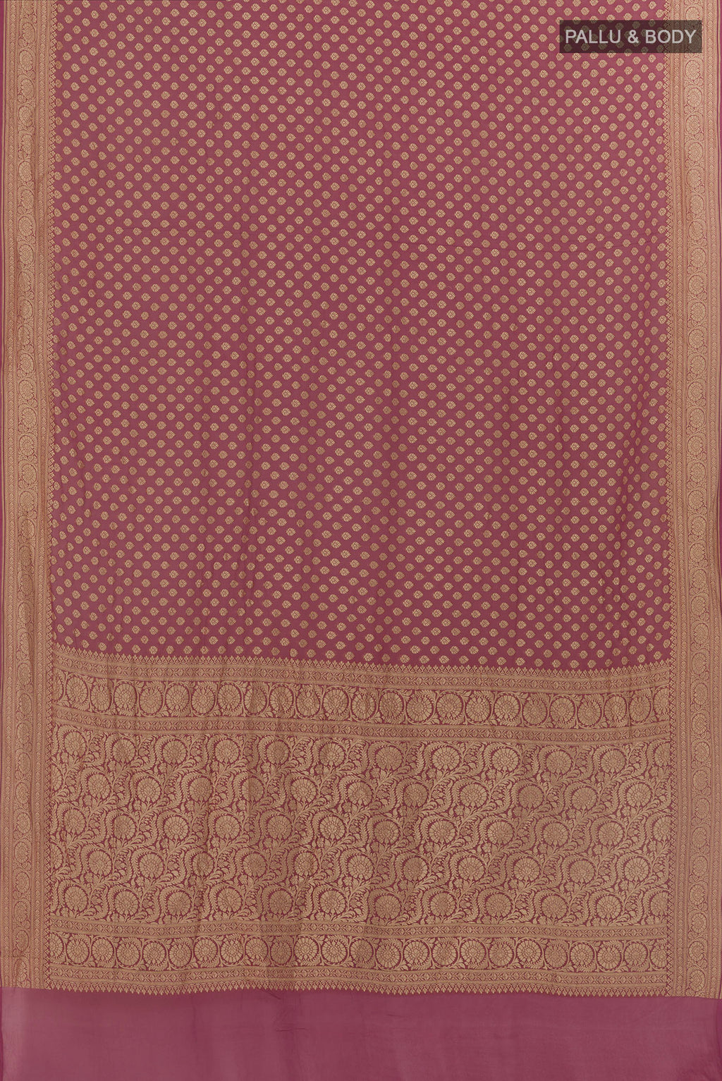 Flat view of Lavender Banarasi Georgette Saree with Zari Butta on the body and Zari Border. 