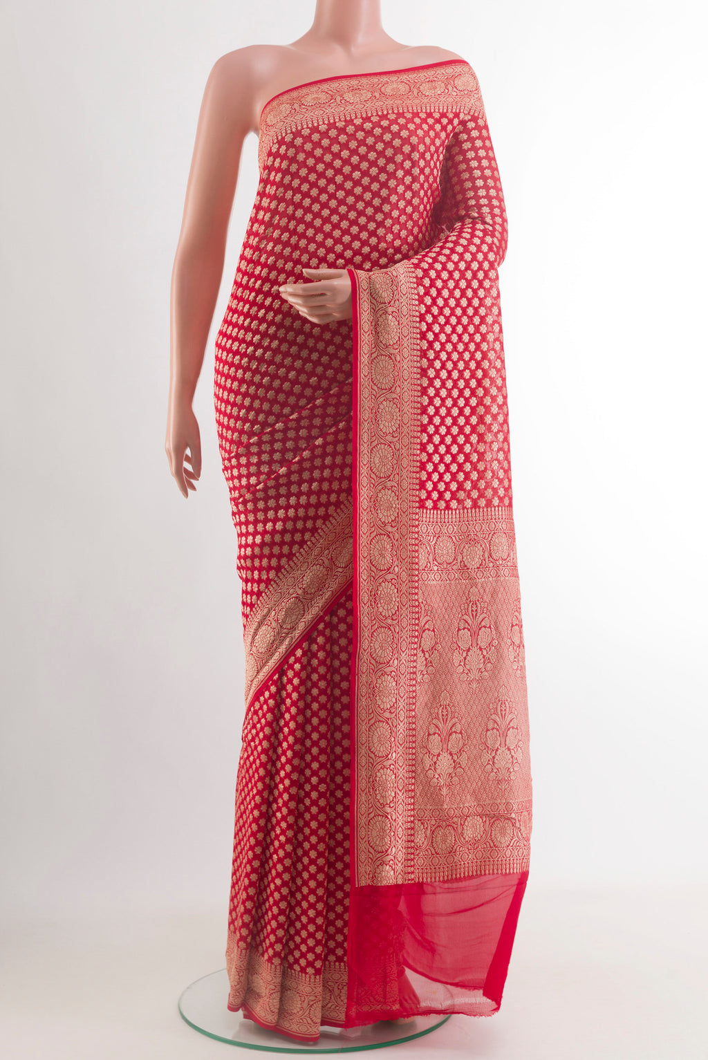 Red Banarasi Georgette Saree with Zari Butta on the body and Zari Border.  displayed on a mannequin