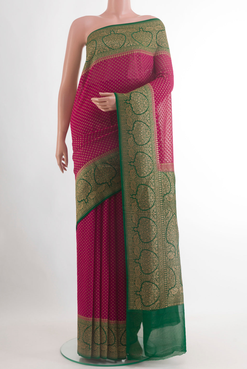 Pink Banarasi Georgette Saree with Zari Butta on the body and Zari Border.  displayed on a mannequin