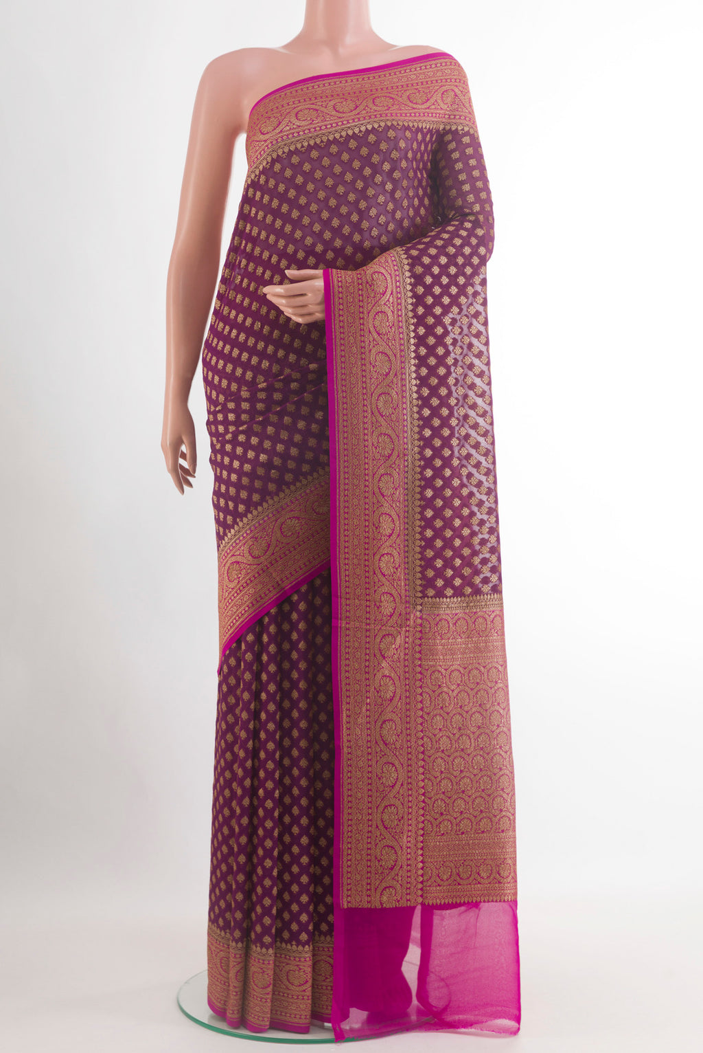 Purple Banarasi Georgette Saree with Zari Butta on the body and Zari Border.  displayed on a mannequin