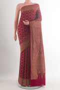 Red Banarasi Georgette Saree with Zari Brocade on the body and Zari Border.  displayed on a mannequin