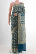 Blue Banarasi Georgette Saree with Zari Brocade on the body and Zari Border.  displayed on a mannequin