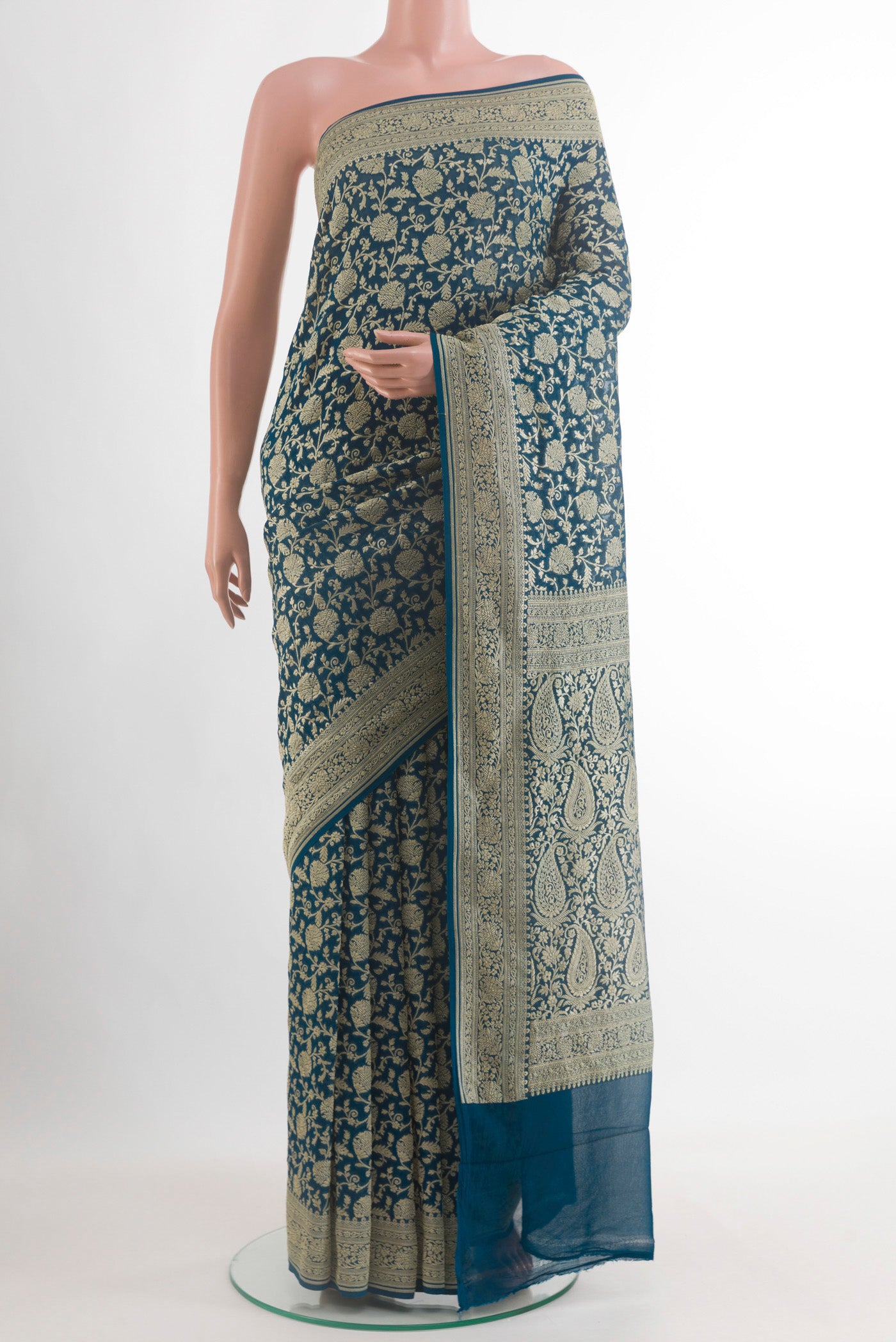Blue Banarasi Georgette Saree with Zari Brocade on the body and Zari Border.  displayed on a mannequin