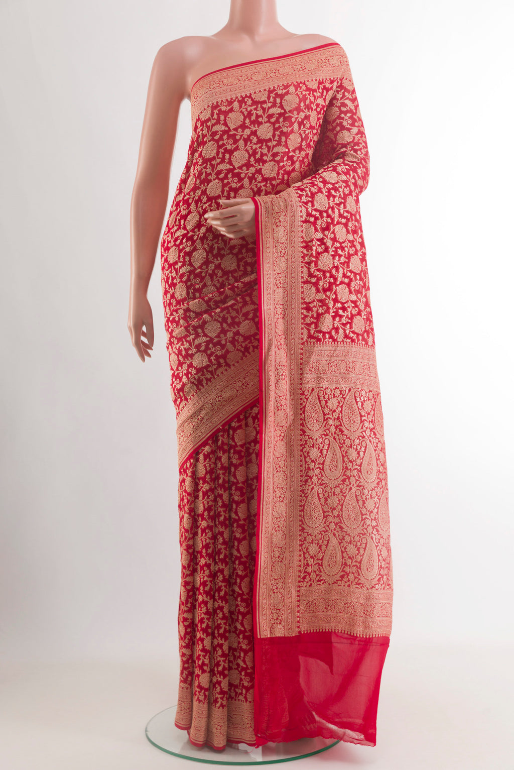 Red Banarasi Georgette Saree with Zari Brocade on the body and Zari Border.  displayed on a mannequin