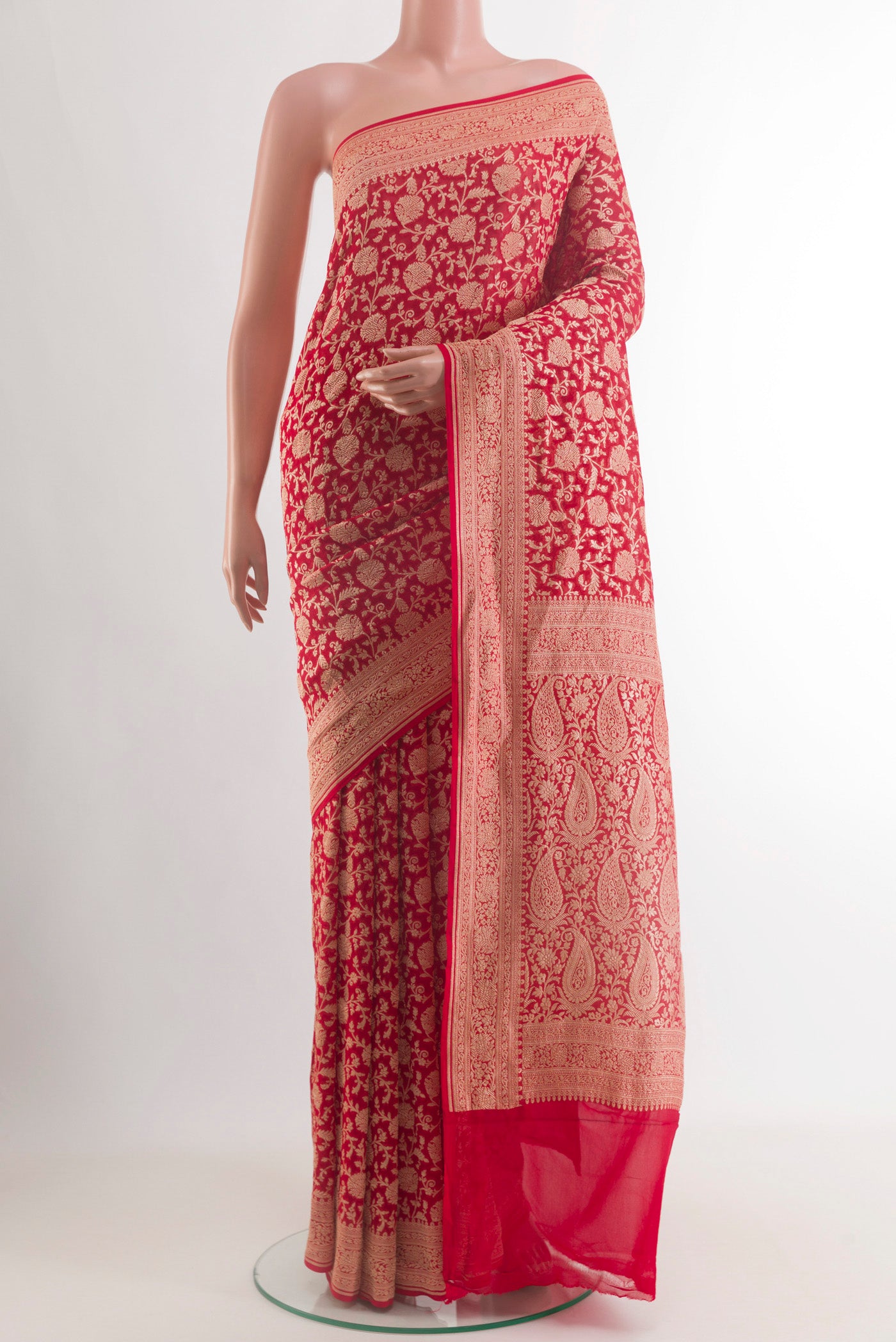 Red Banarasi Georgette Saree with Zari Brocade on the body and Zari Border.  displayed on a mannequin