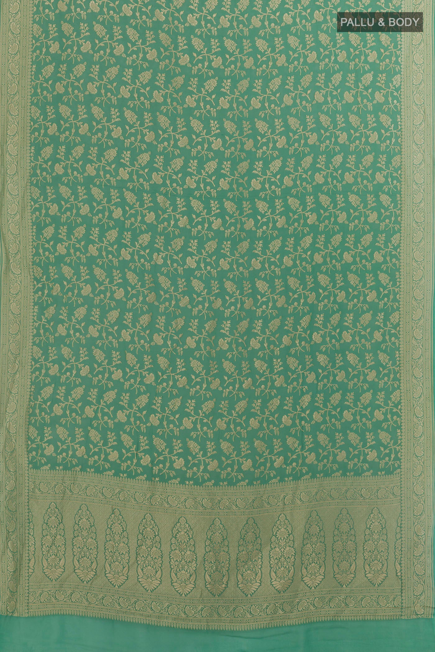 Flat view of Turquoise Banarasi Georgette Saree with Zari Brocade on the body and Zari Border. 