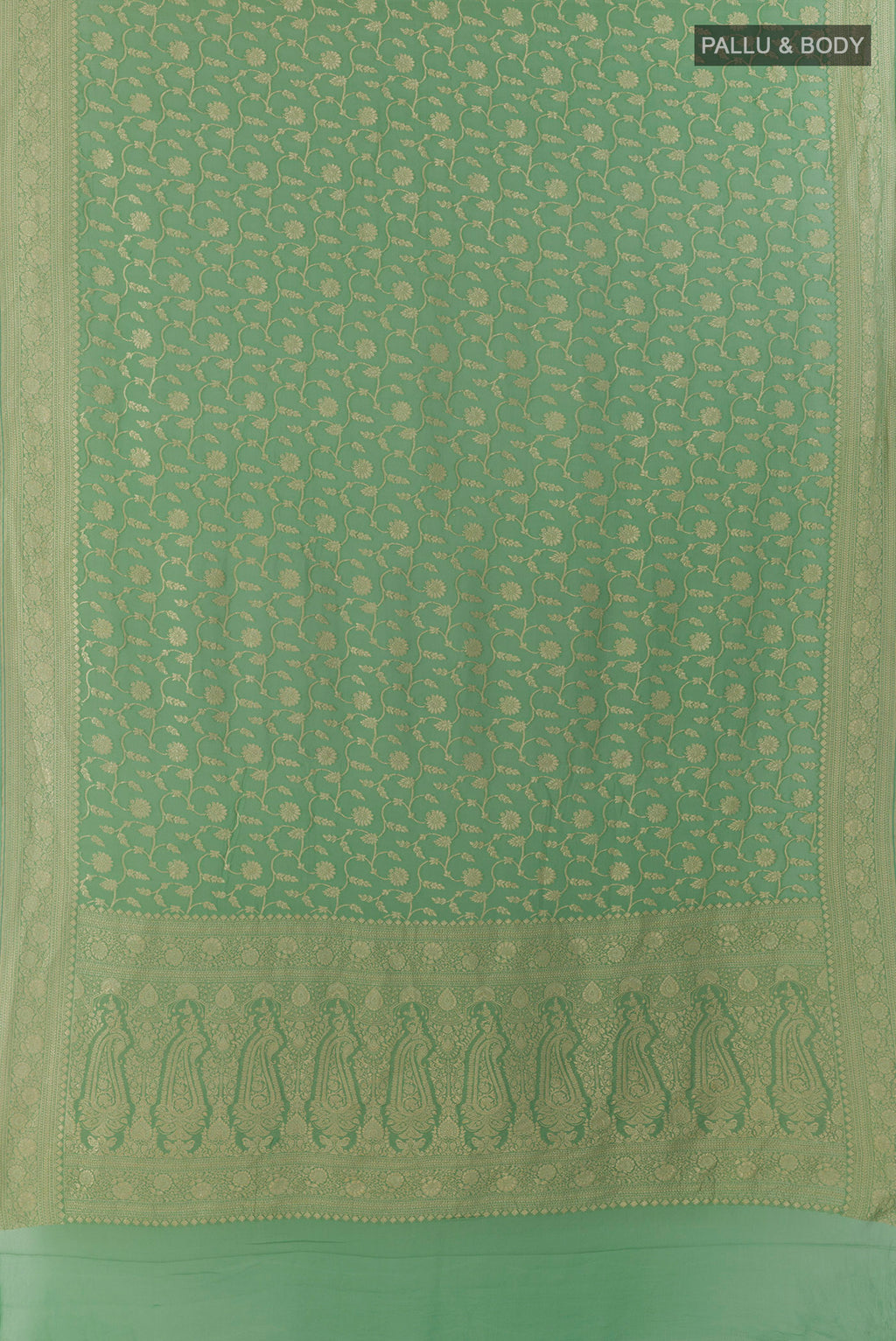 Flat view of Green Banarasi Georgette Saree with Zari Brocade on the body and Zari Border. 
