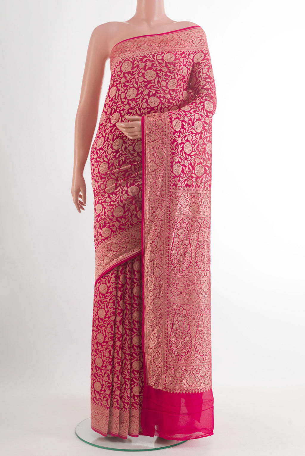Pink Banarasi Georgette Saree with Zari Brocade on the body and Zari Border.  displayed on a mannequin
