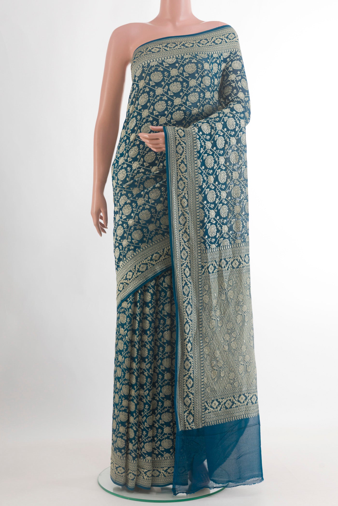 Blue Banarasi Georgette Saree with Zari Brocade on the body and Zari Border.  displayed on a mannequin