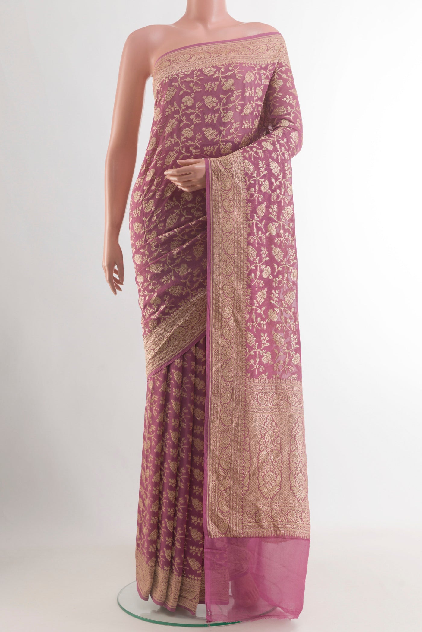 Lavender Banarasi Georgette Saree with Zari Brocade on the body and Zari Border.  displayed on a mannequin