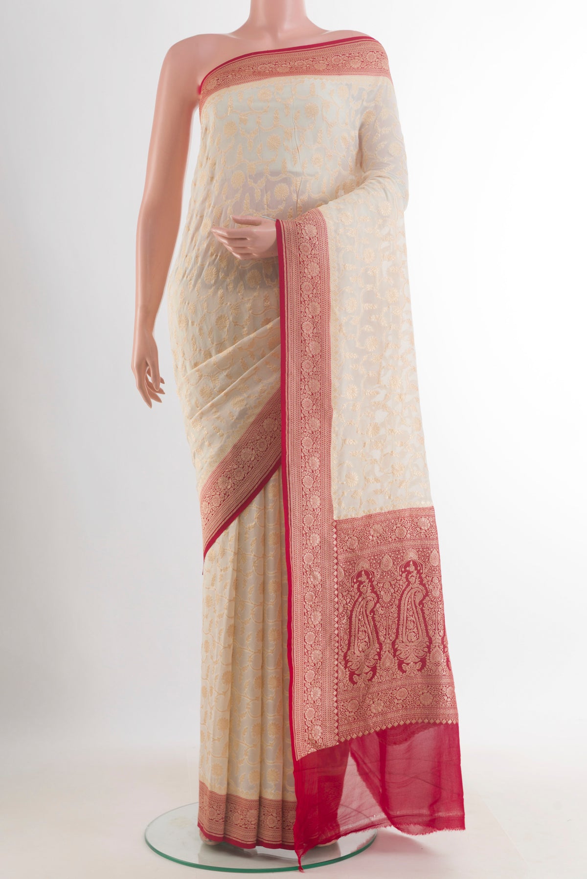 Off White Banarasi Georgette Saree with Zari Brocade on the body and Zari Border.  displayed on a mannequin
