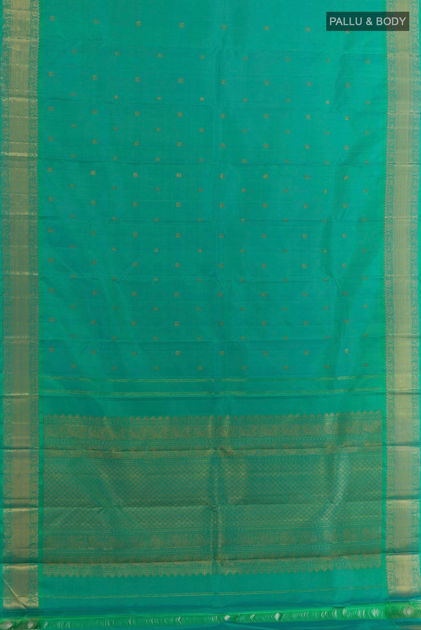 Flat view of Turquoise Kanchipuram Silk Saree with Zari Butta on the body and Zari Border. 