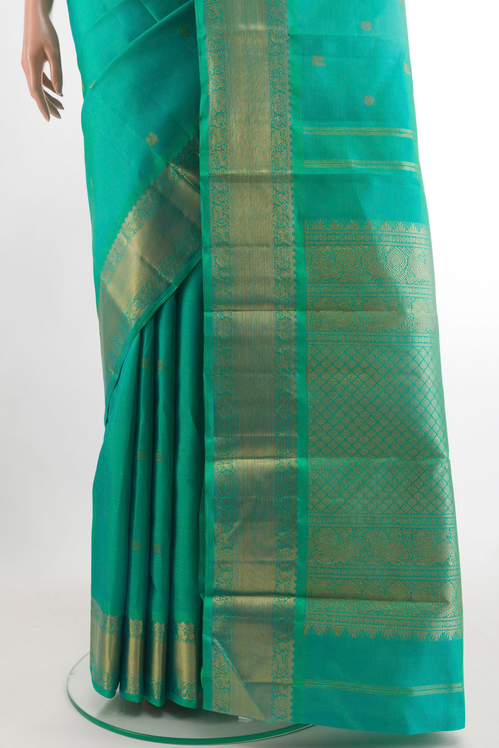 Pleats and pallu of Turquoise Kanchipuram Silk Saree with Zari Butta on the body and Zari Border. 