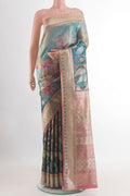 Peacock Blue Kanchipuram Tissue Silk Saree with Zari Brocade on the body and Zari Border.  displayed on a mannequin
