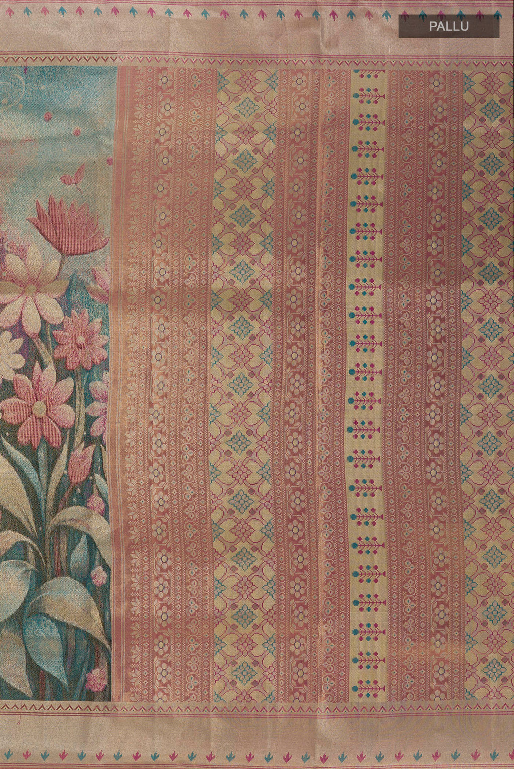 Close up image of the pallu of Peacock Blue Kanchipuram Tissue Silk Saree with Zari Brocade on the body and Zari Border. 