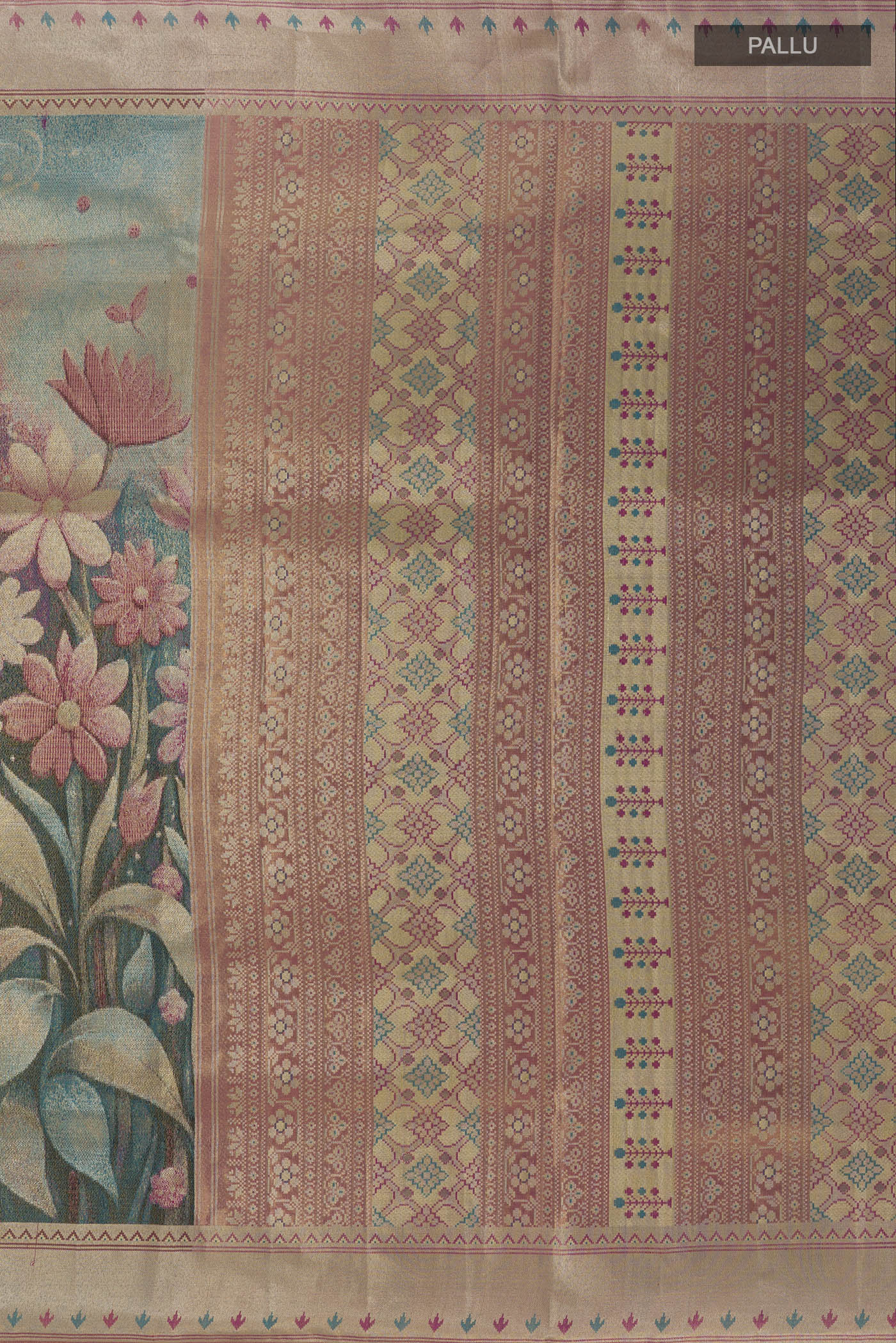 Close up image of the pallu of Peacock Blue Kanchipuram Tissue Silk Saree with Zari Brocade on the body and Zari Border. 