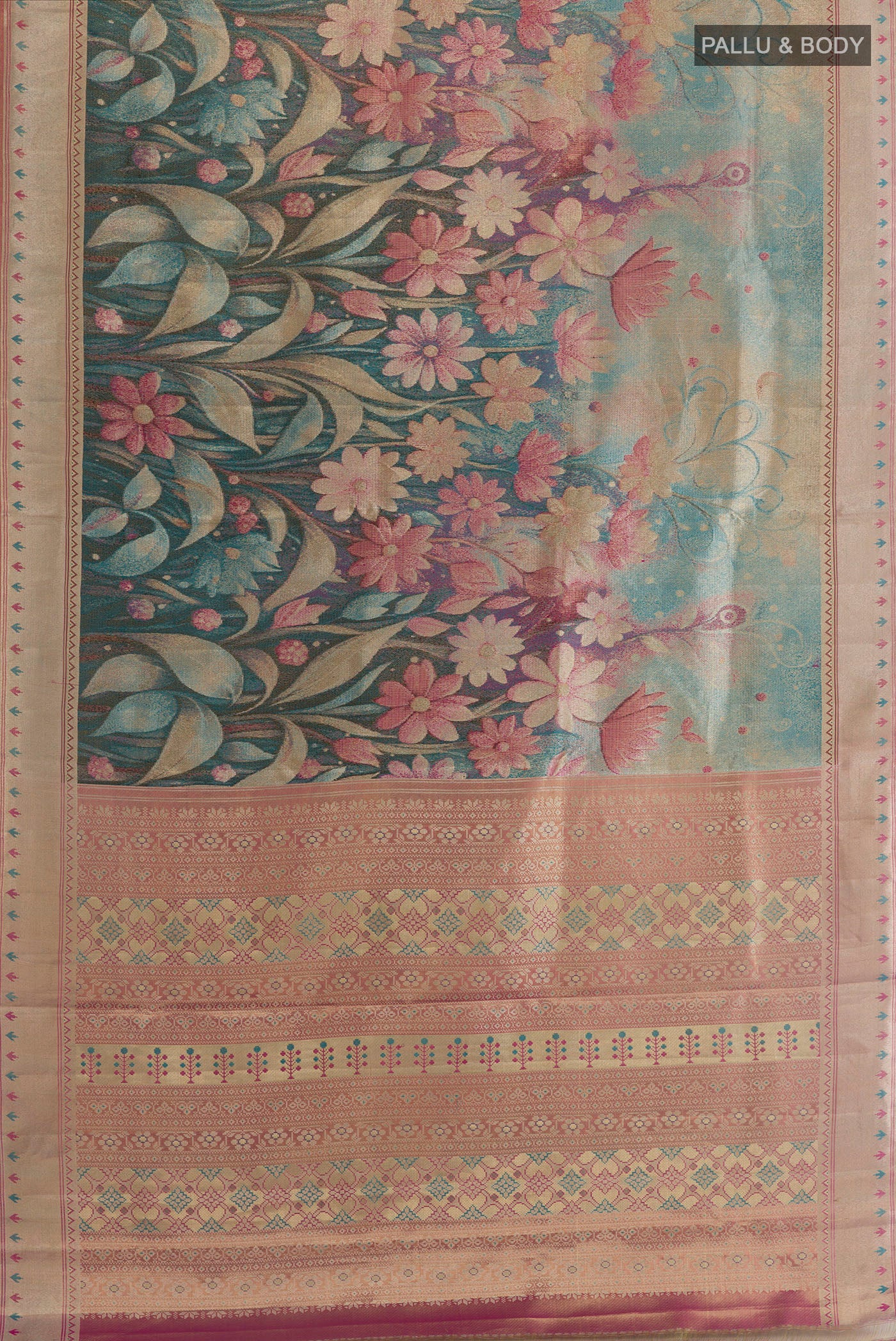 Flat view of Peacock Blue Kanchipuram Tissue Silk Saree with Zari Brocade on the body and Zari Border. 