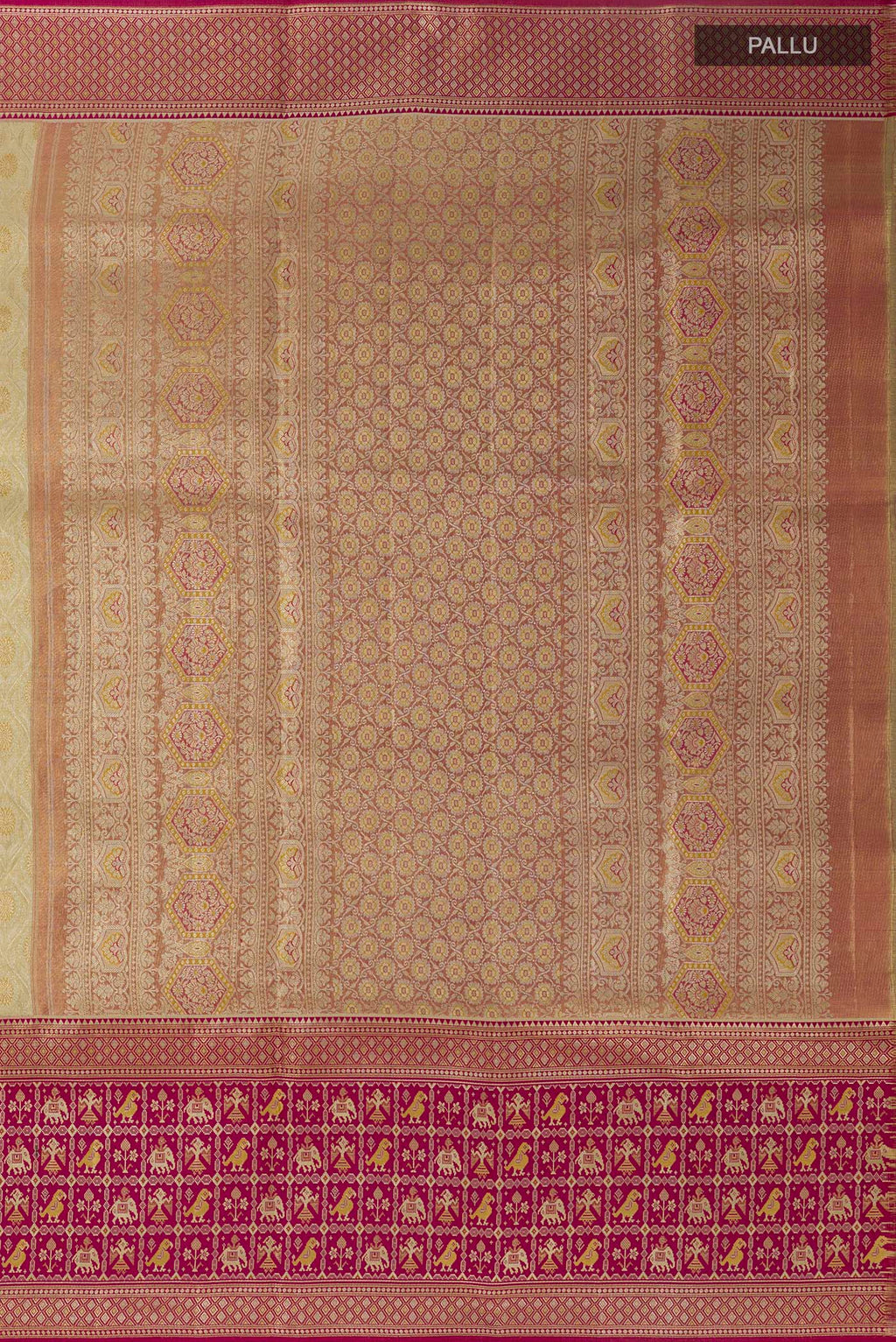 Close up image of the pallu of Cream Kanchipuram Tissue Silk Saree with Zari Brocade on the body and Zari Border. 