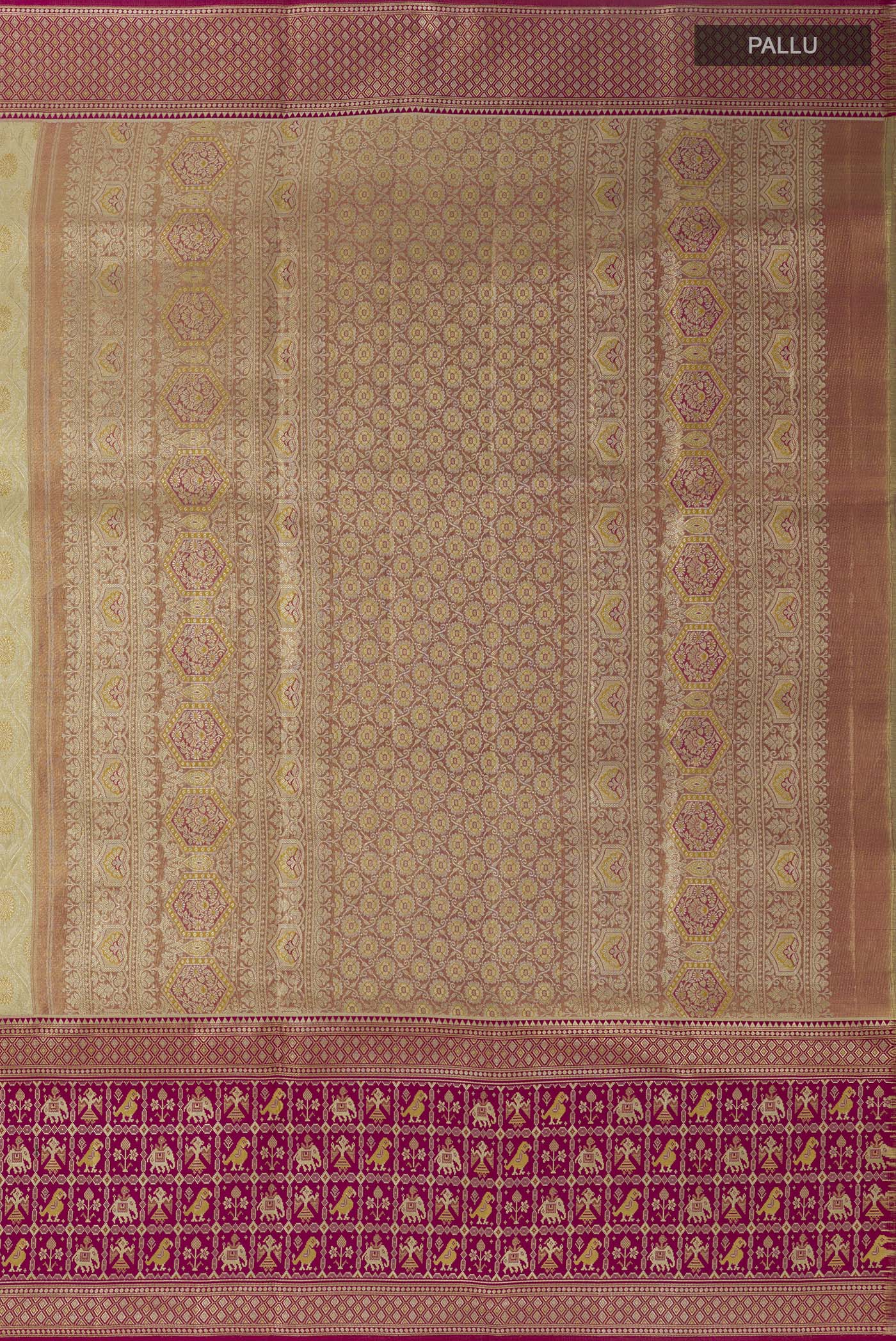 Close up image of the pallu of Cream Kanchipuram Tissue Silk Saree with Zari Brocade on the body and Zari Border. 