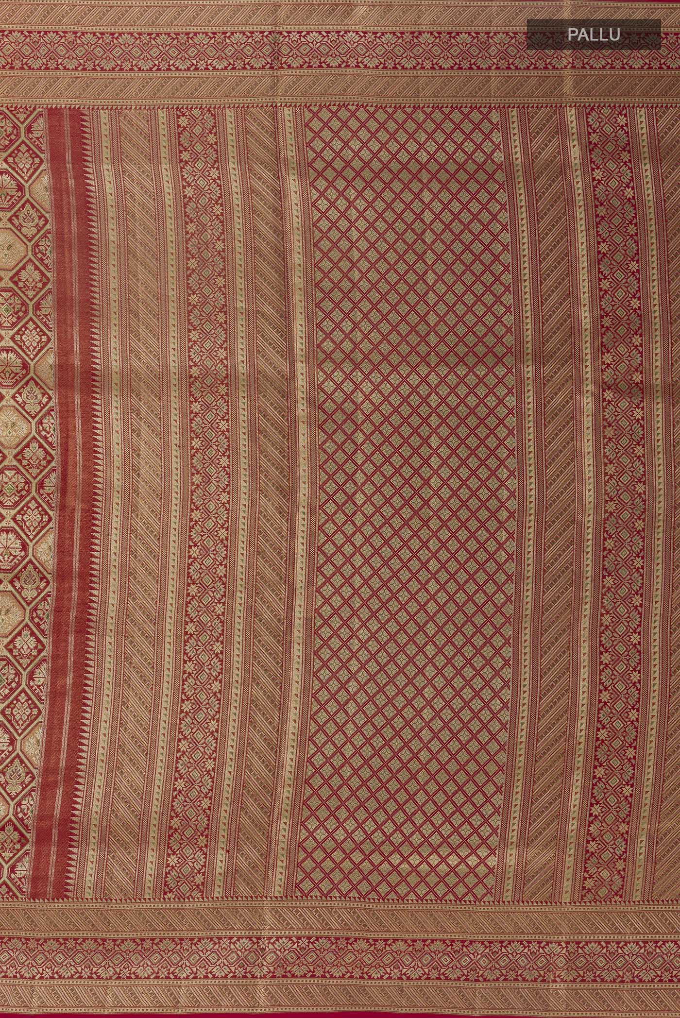 Close up image of the pallu of Maroon Kanchipuram Tissue Silk Saree with Zari Brocade on the body and Zari Border. 