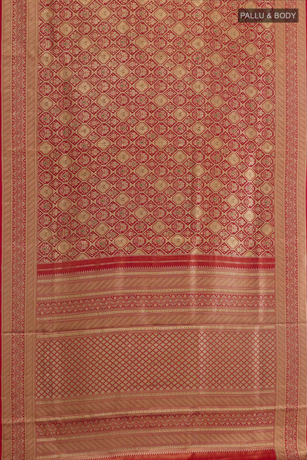 Flat view of Maroon Kanchipuram Tissue Silk Saree with Zari Brocade on the body and Zari Border. 