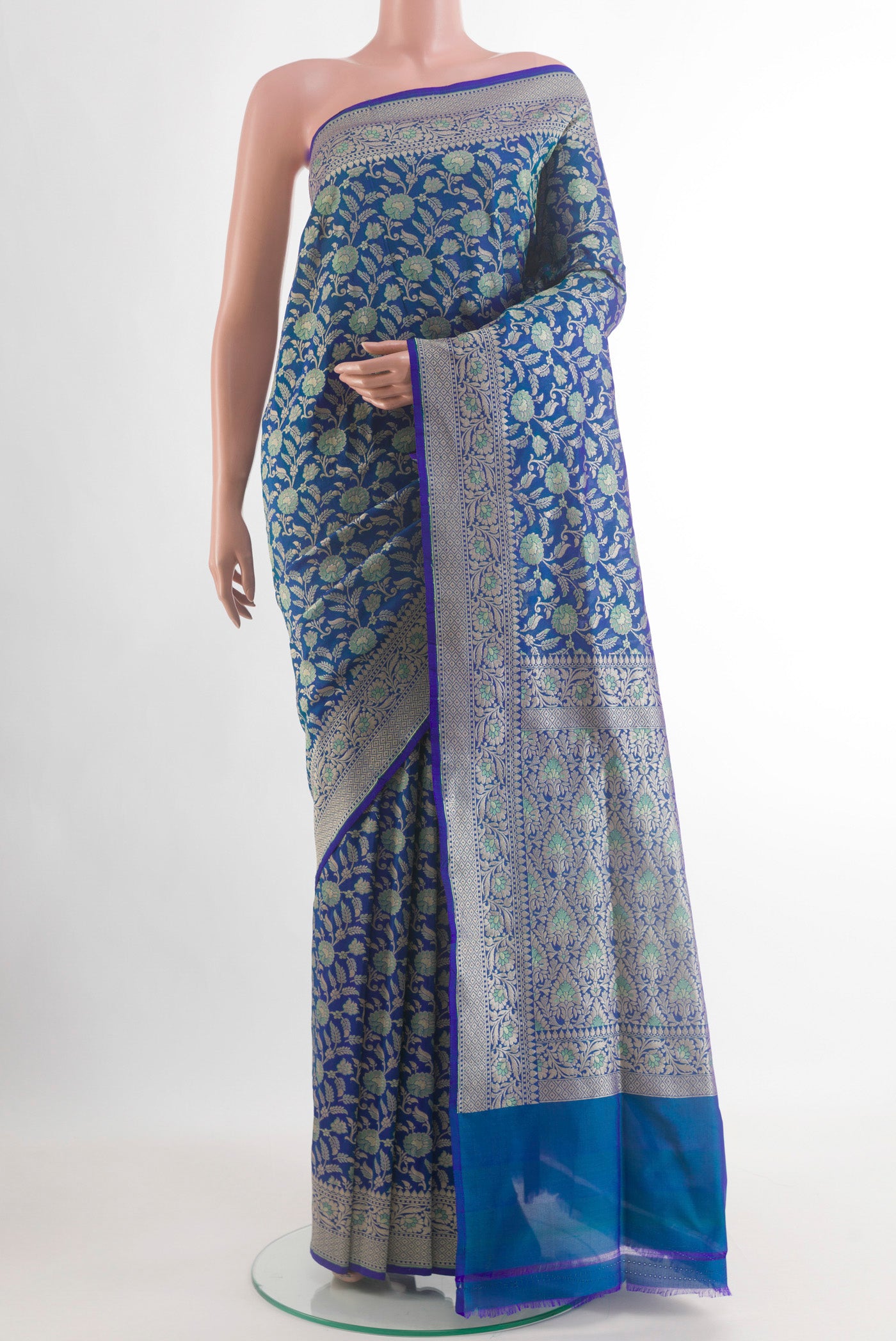 Blue Banarasi Silk Saree with Zari Brocade on the body and Zari Border.  displayed on a mannequin
