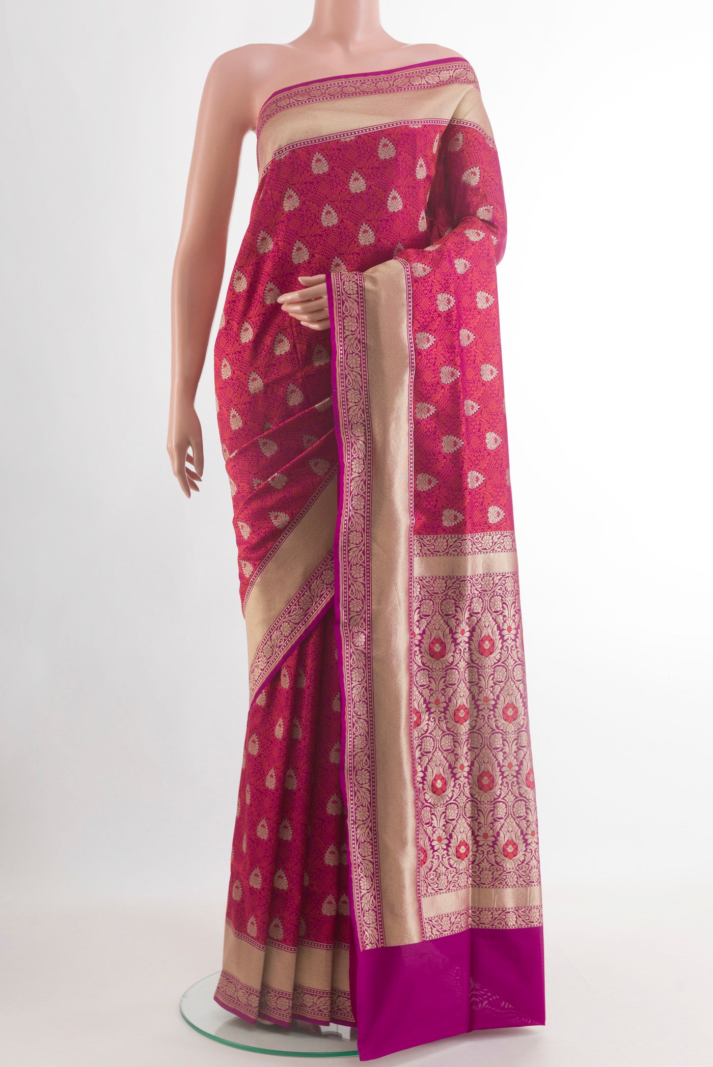 Dark Pink Banarasi Silk Saree with Zari Brocade on the body and Zari Border.  displayed on a mannequin