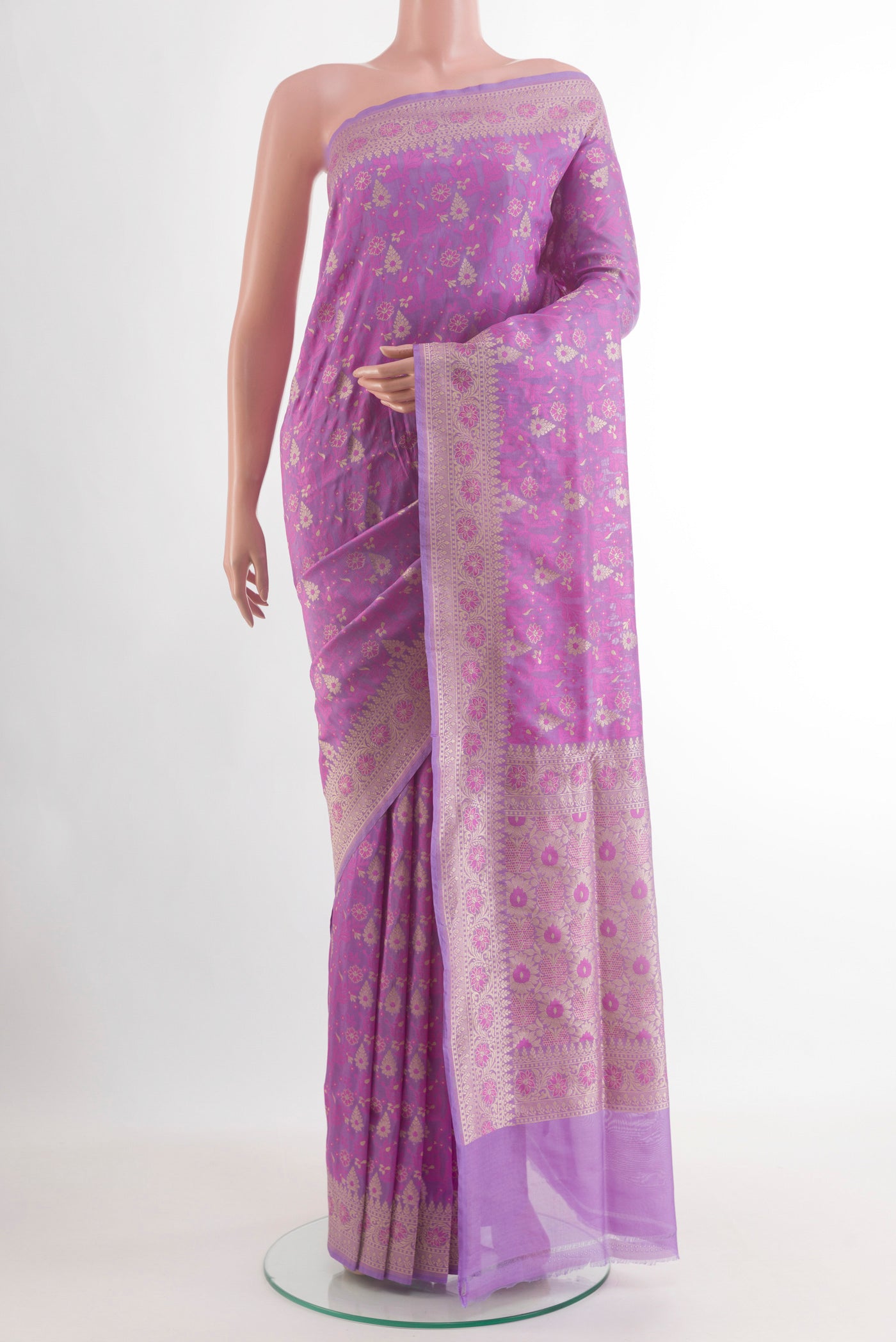 Lavender Banarasi Silk Saree with Zari And Thread Butta on the body and Zari Border.  displayed on a mannequin
