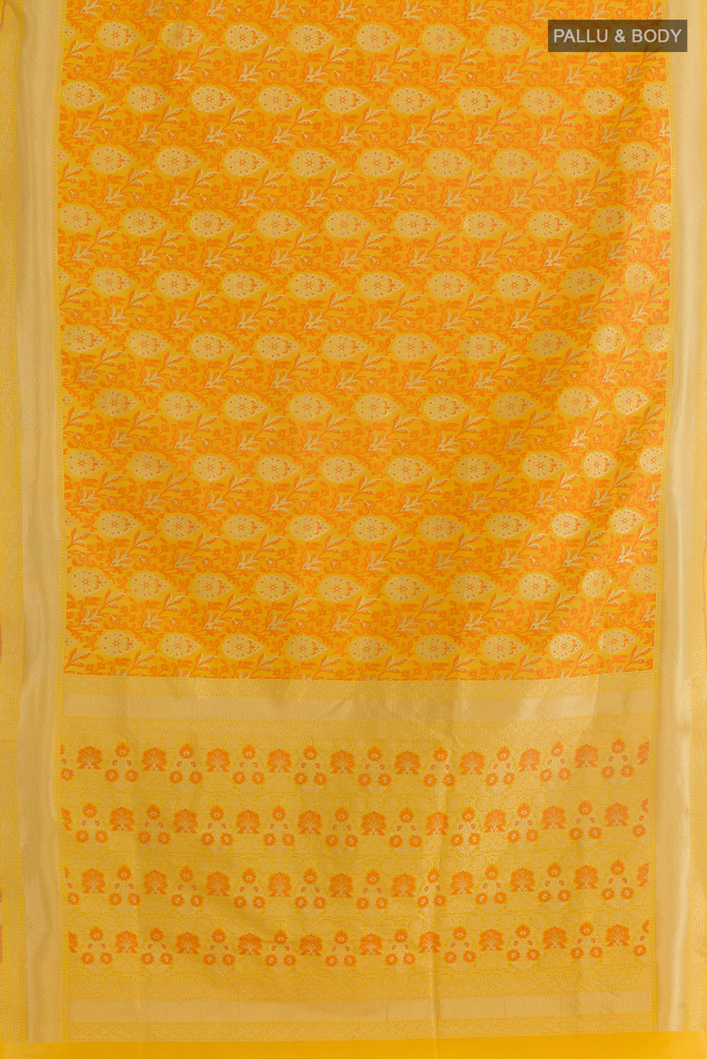 Flat view of Yellow Banarasi Silk Saree with Zari And Thread Butta on the body and Zari Border. 
