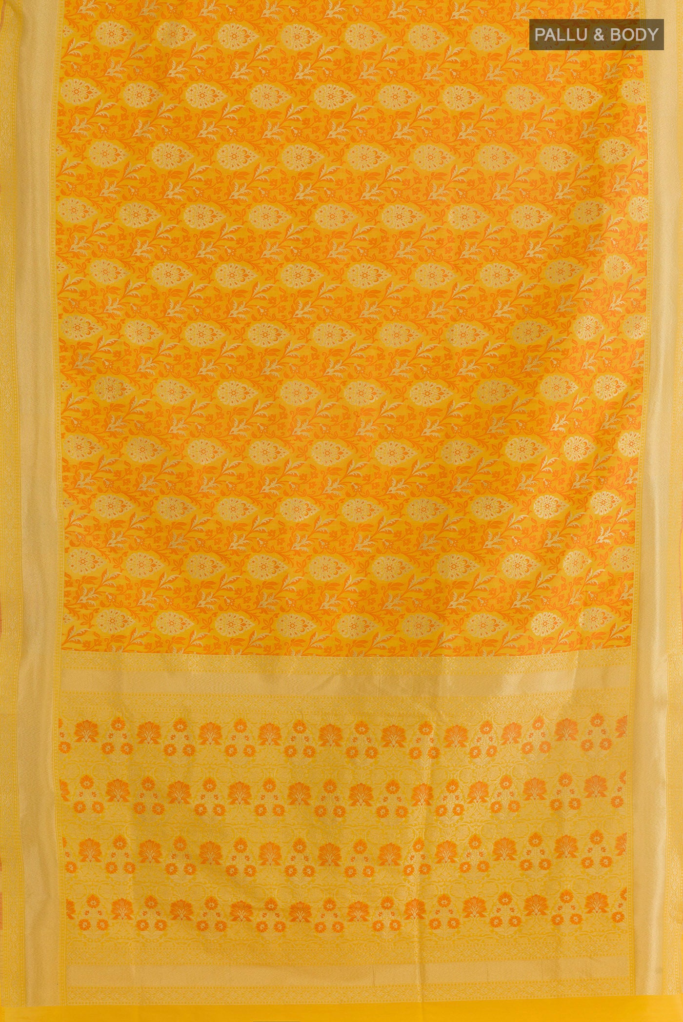 Flat view of Yellow Banarasi Silk Saree with Zari And Thread Butta on the body and Zari Border. 