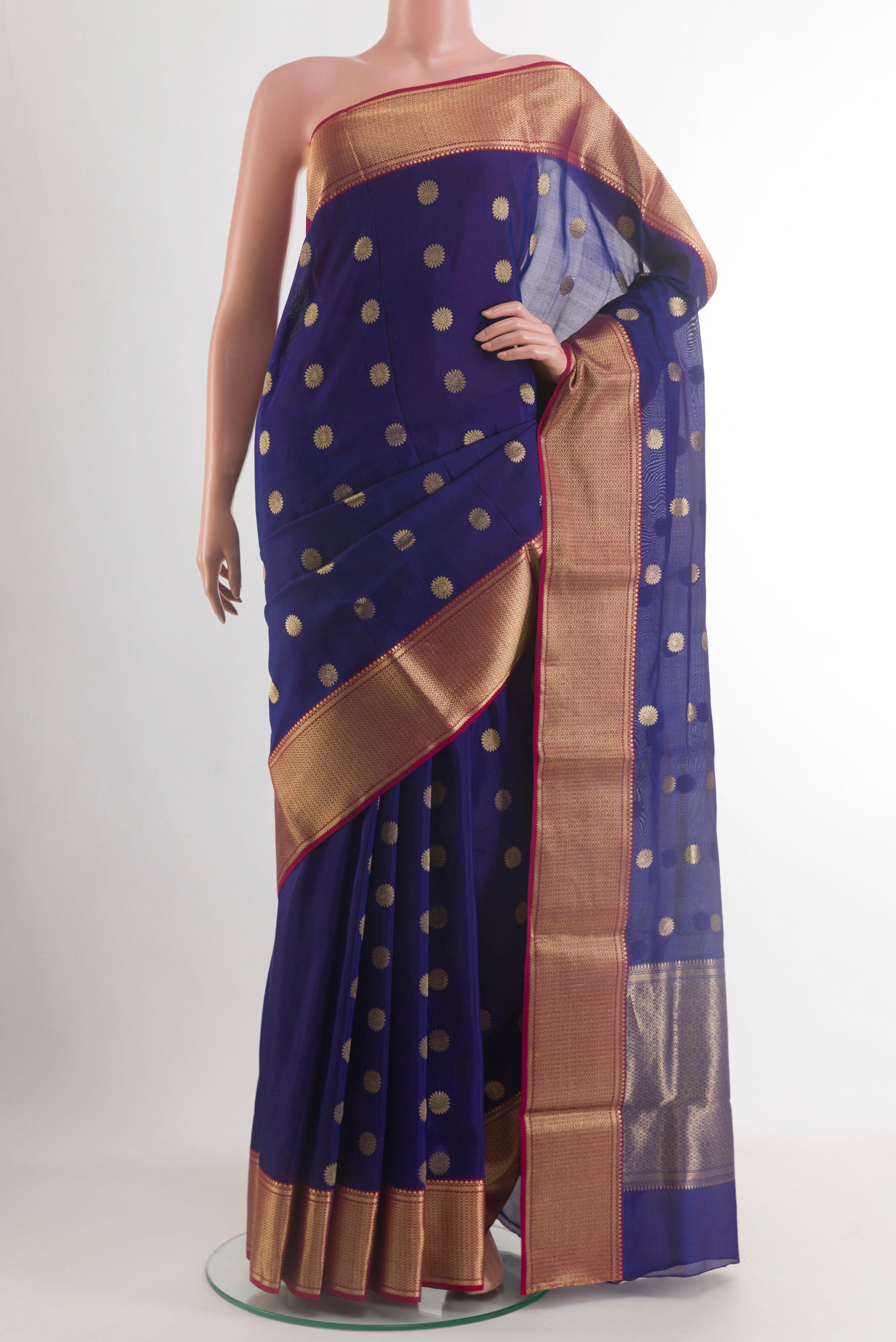Navy Blue Chanderi Silk Saree with Zari Butta on the body and Zari Border.  displayed on a mannequin