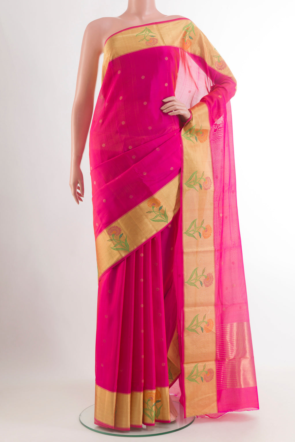 Pink Chanderi Silk Saree with Zari Butta on the body and Zari Border.  displayed on a mannequin