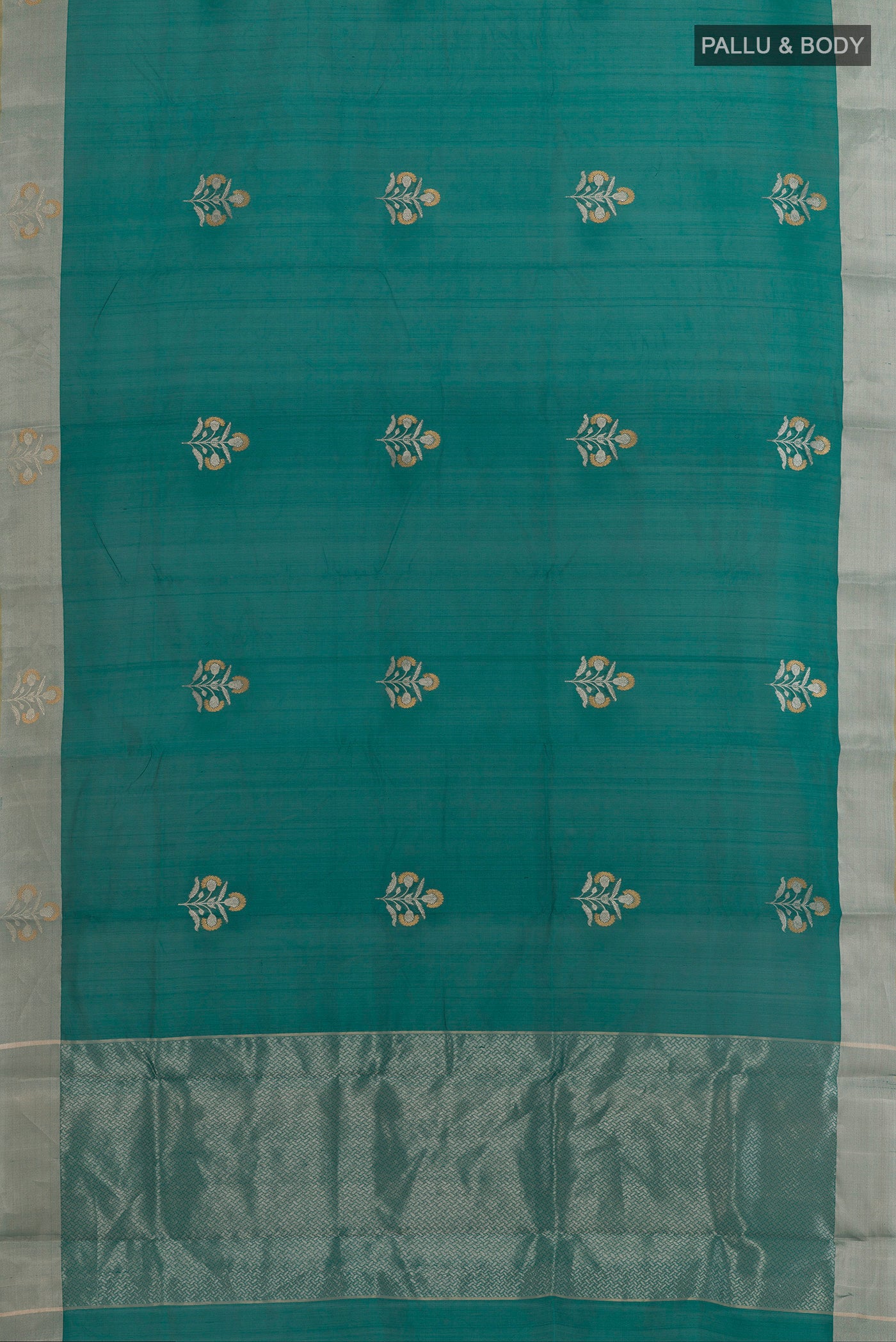 Flat view of Green Chanderi Silk Saree with Zari Butta on the body and Zari Border. 