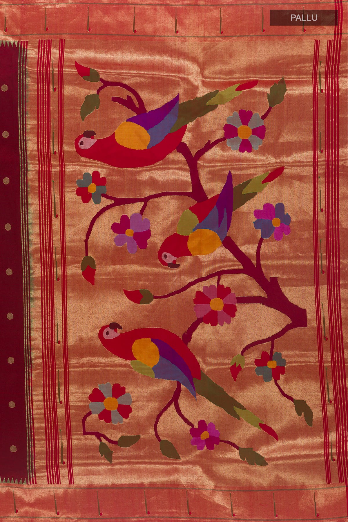 Close up image of the pallu of Pure Silk Maroon Paithani Saree with Zari Butta on the body and Paithani Border. 