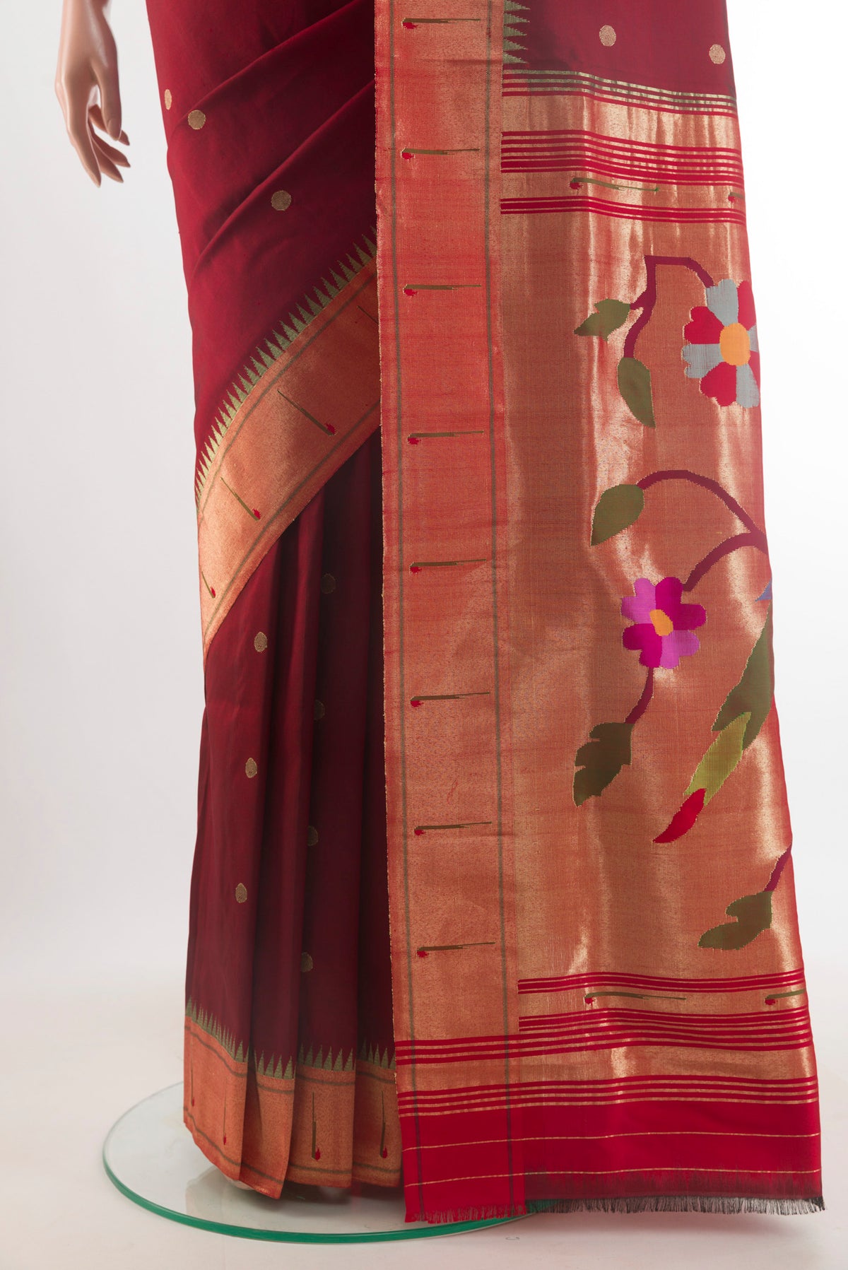 Pleats and pallu of Pure Silk Maroon Paithani Saree with Zari Butta on the body and Paithani Border. 