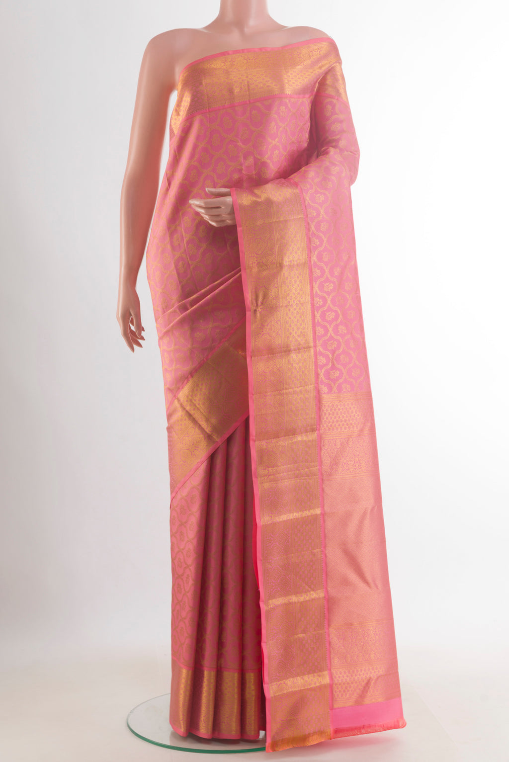 Pure Silk Pink Kanjivaram Saree with Zari Brocade on the body and Zari Border.  displayed on a mannequin