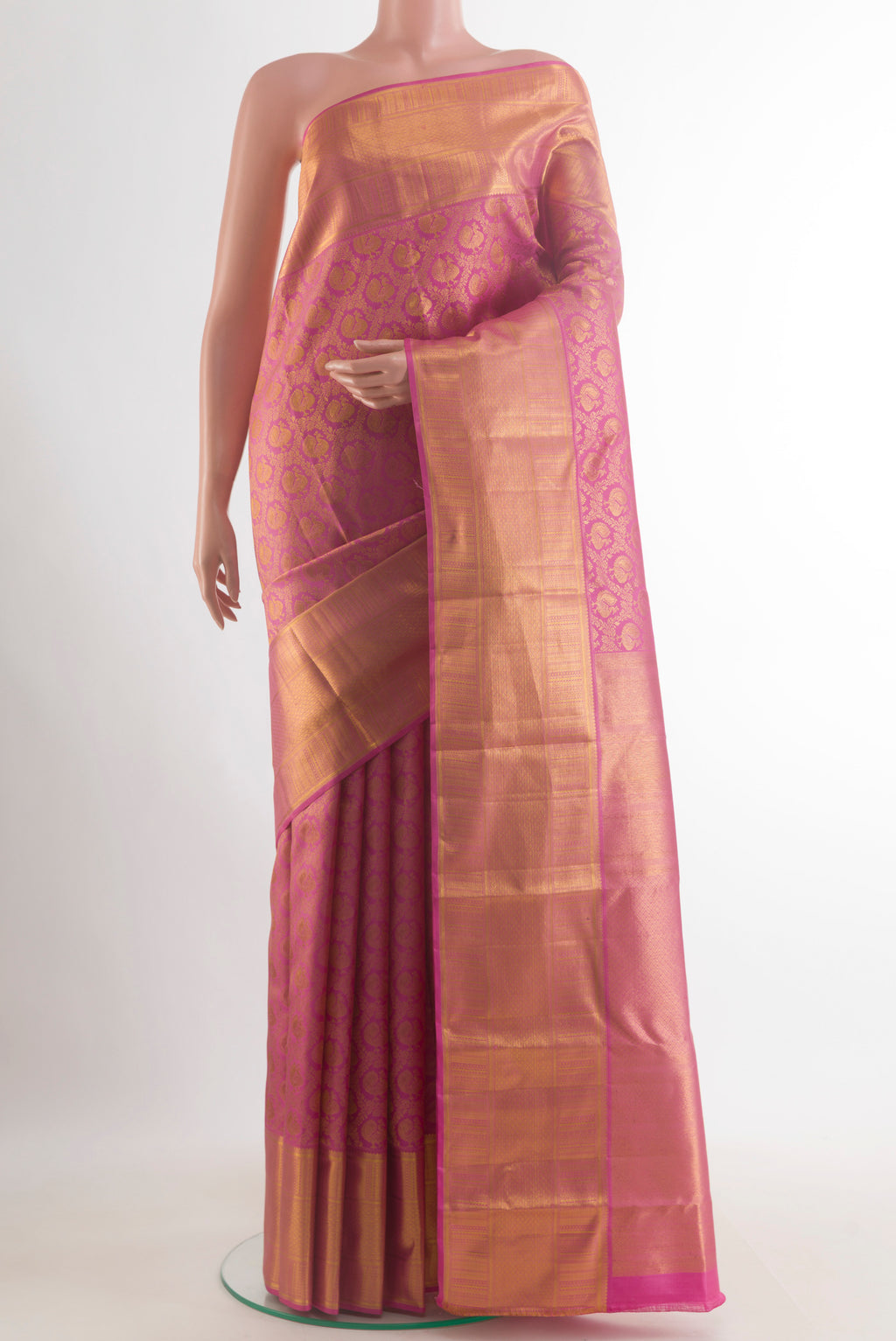 Pure Silk Pink Kanjivaram Saree with Zari Brocade on the body and Zari Border.  displayed on a mannequin