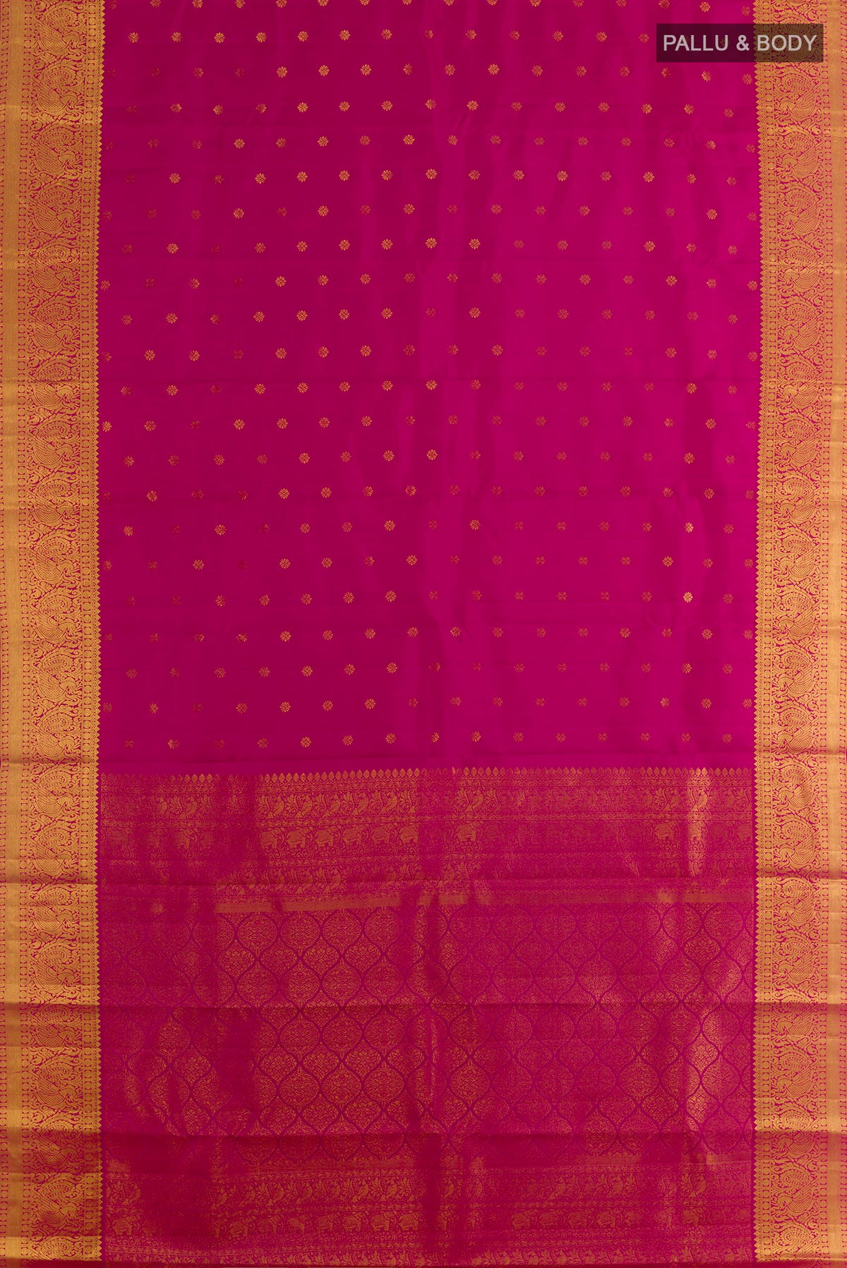 Flat view of Pure Silk Dark Pink Kanjivaram Saree with Zari Butta on the body and Zari Border. 