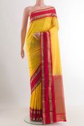 Yellow Bangalore Silk Saree with Plain Body and Zari Border.  displayed on a mannequin