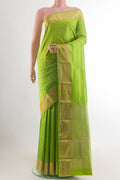Parrot Green Bangalore Silk Saree with Zari Butta on the body and Zari Border.  displayed on a mannequin