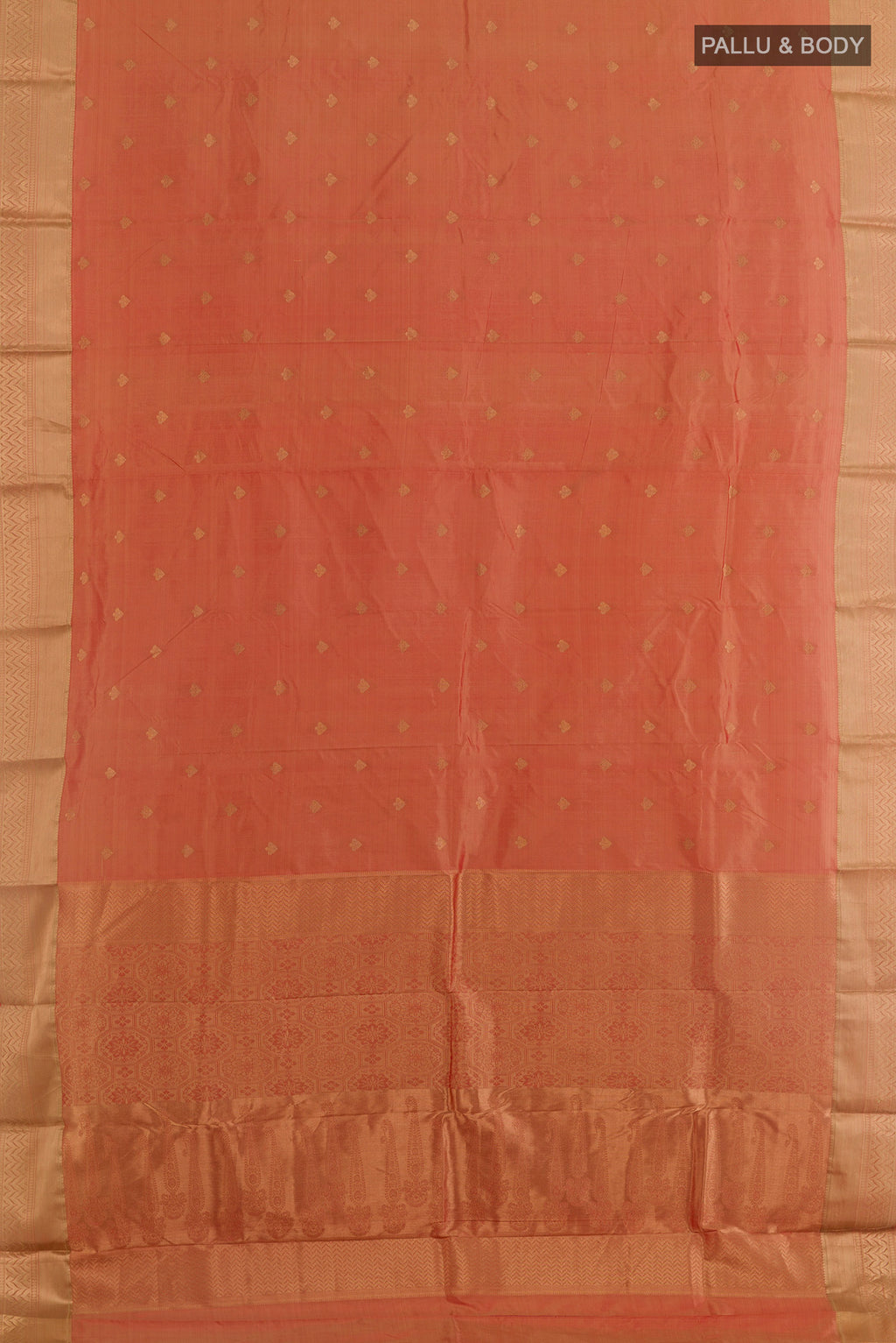 Flat view of Peach Bangalore Silk Saree with Zari Butta on the body and Zari Border. 