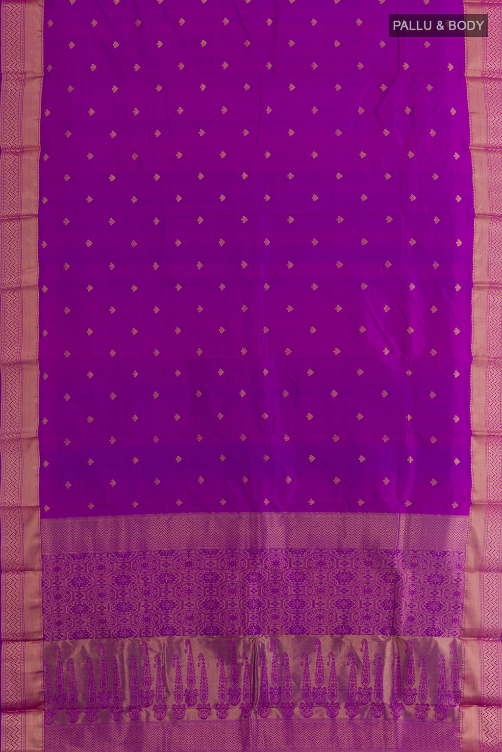 Flat view of Purple Kanjivaram Silk Saree with Zari Butta on the body and Zari Border. 