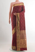 Maroon Bangalore Silk Saree with Zari Butta on the body and Zari Border.  displayed on a mannequin