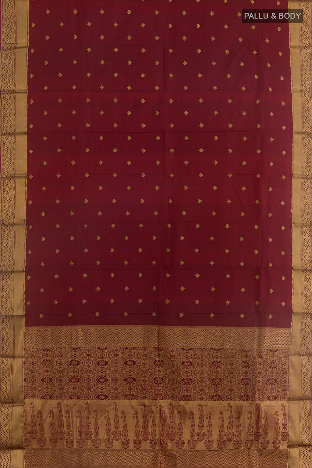 Flat view of Maroon Bangalore Silk Saree with Zari Butta on the body and Zari Border. 