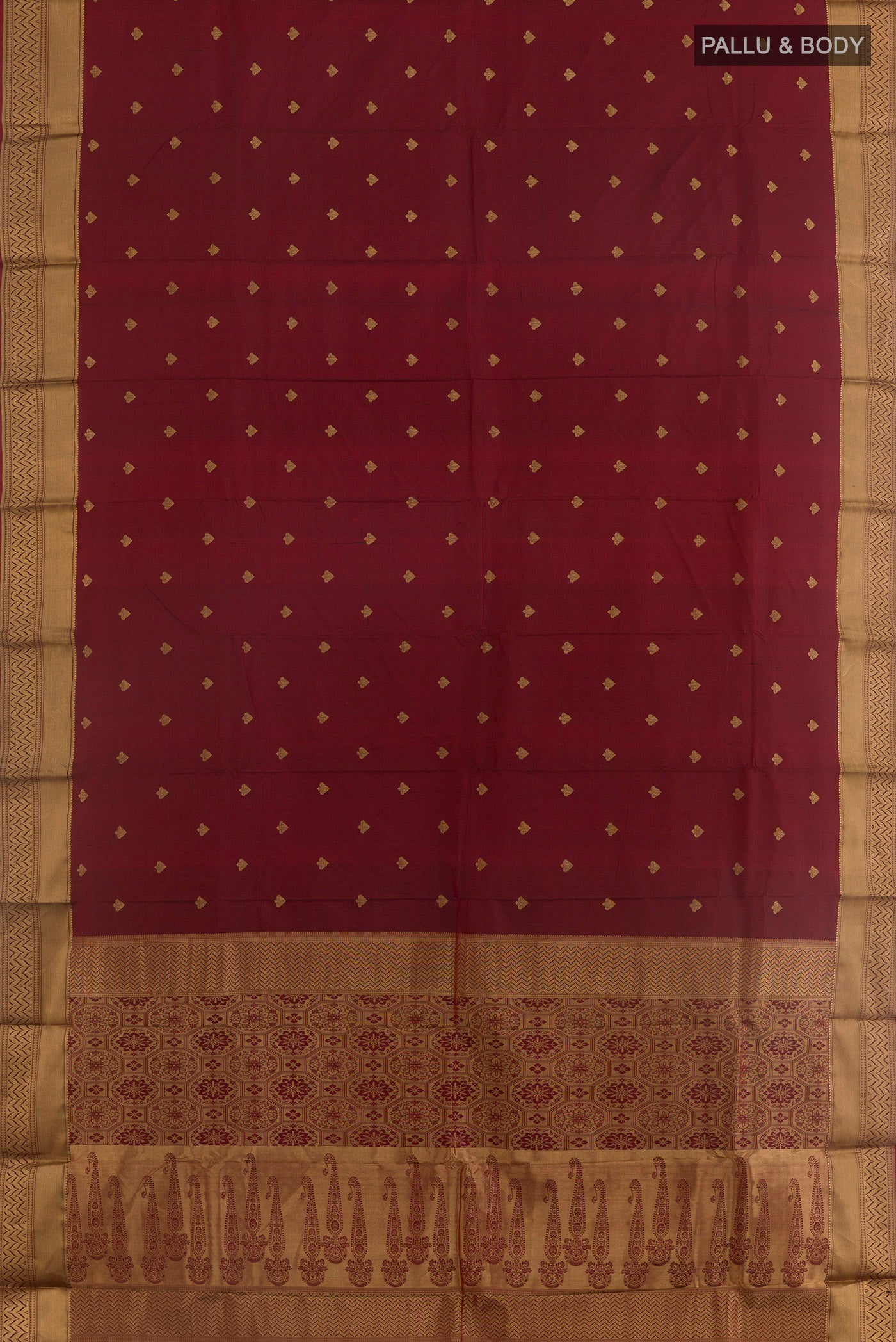 Flat view of Maroon Bangalore Silk Saree with Zari Butta on the body and Zari Border. 