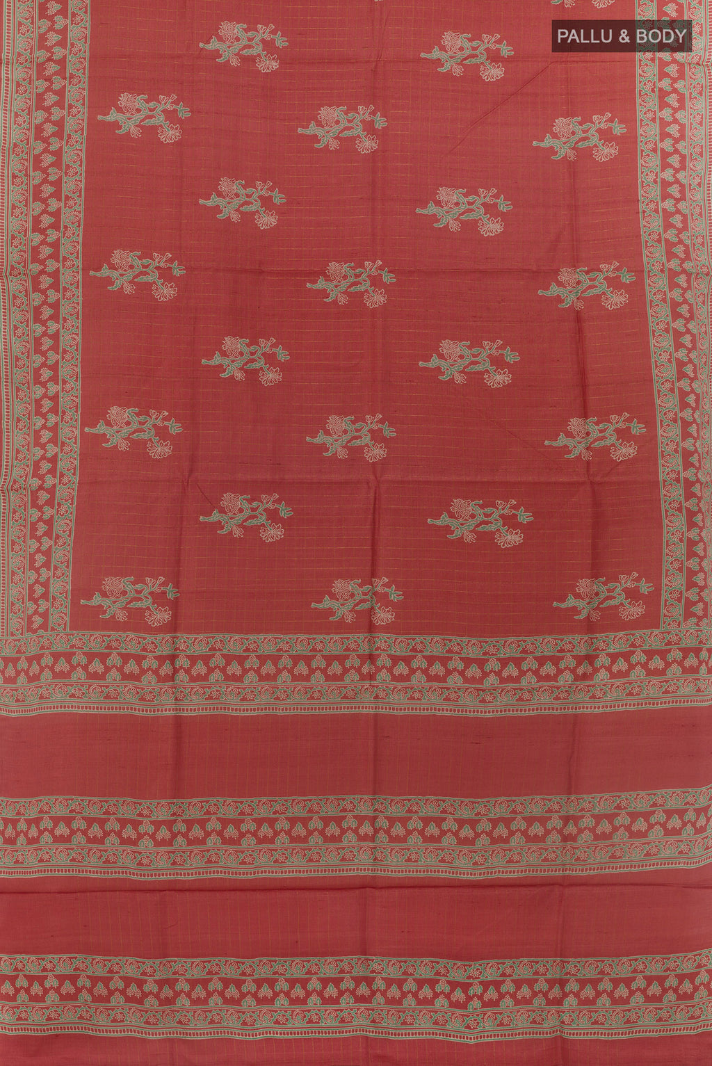 Flat view of Rust Tussar Silk Saree with Printed design on the body and Printed Border. 